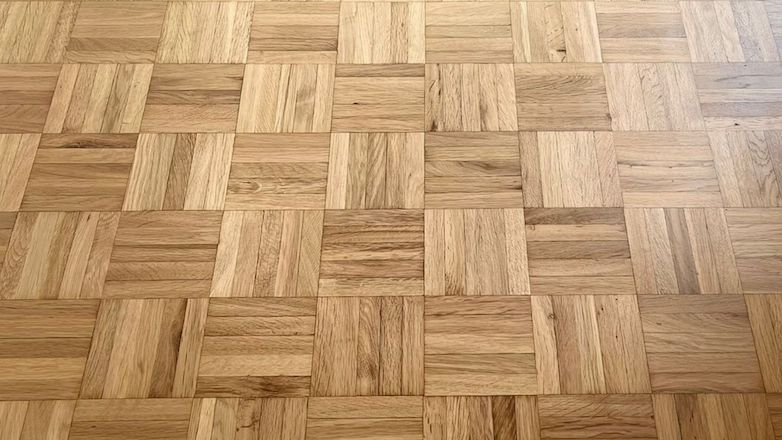 Ponçage et vitrification d’un parquet mosaïque à Toulouse