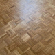 Réparation et rénovation d’un parquet mosaïque après dégât des eaux à Aix-en-Provence