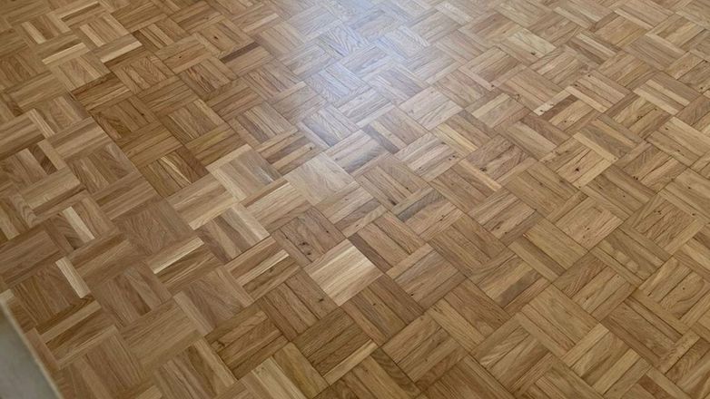 Réparation et rénovation d’un parquet mosaïque après dégât des eaux à Aix-en-Provence